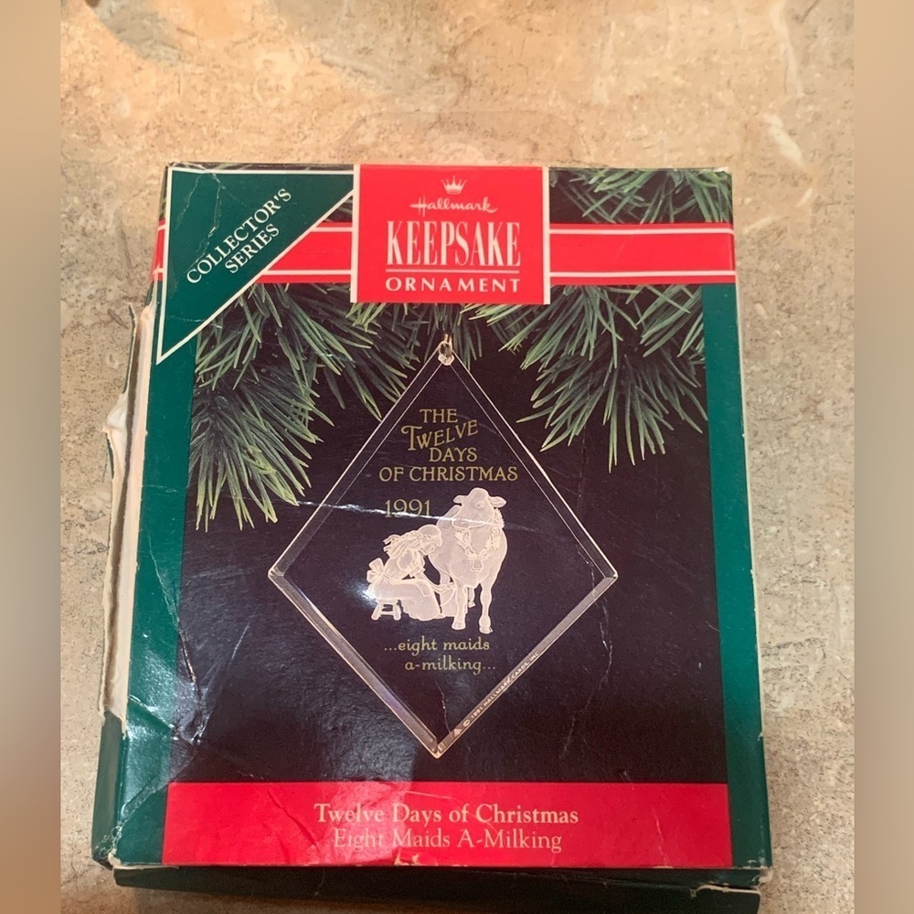 Hallmark ornament, the 12 days of Christmas 1991. 8 maids a milking.